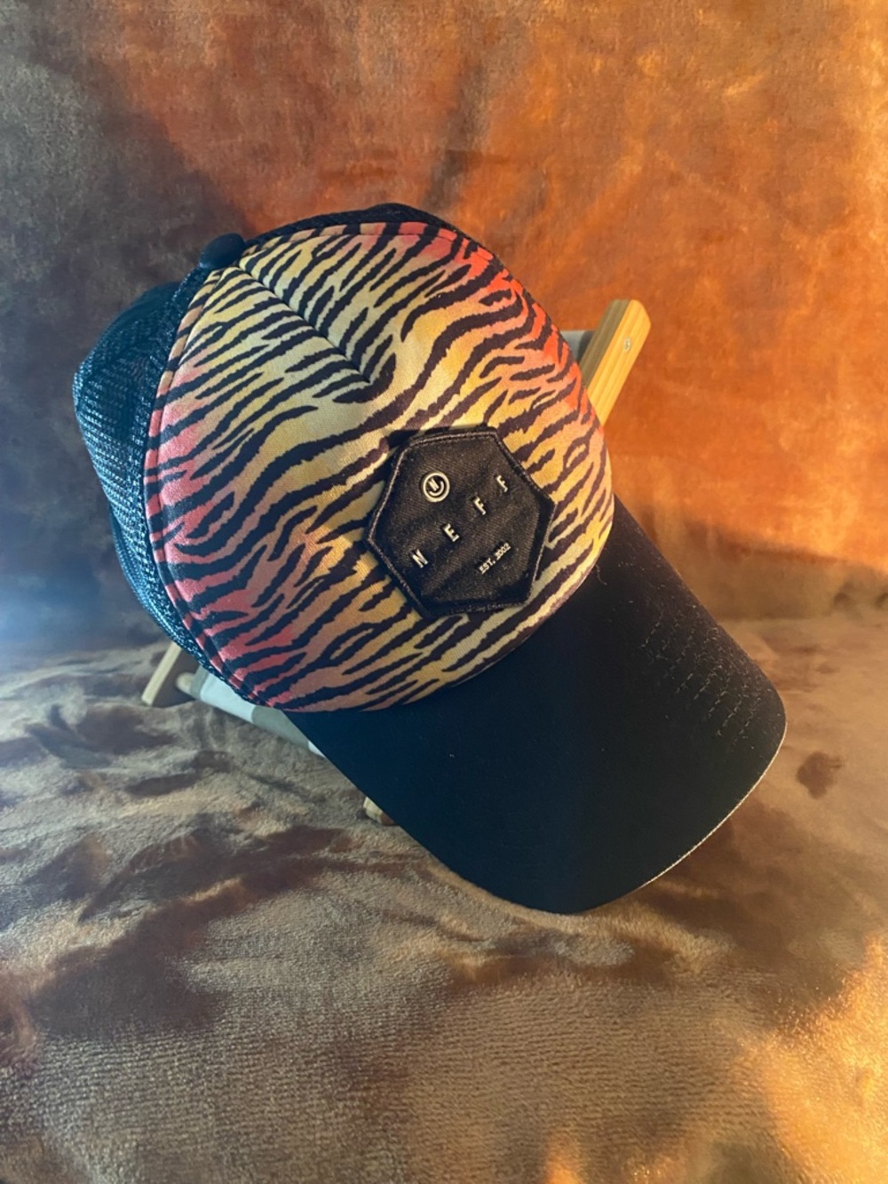 Neff Black Trucker Hat with Orange Tiger Stripe Front